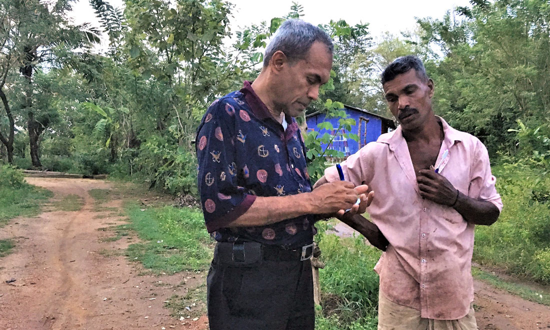 photo of mother holding baby